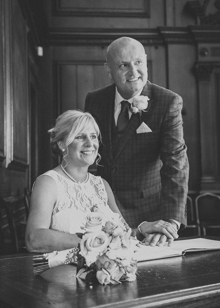 Bride & Groom signing register in the Ballroom, Morpeth Town Hall