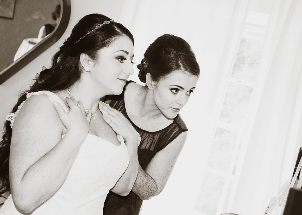 Bride checking necklace