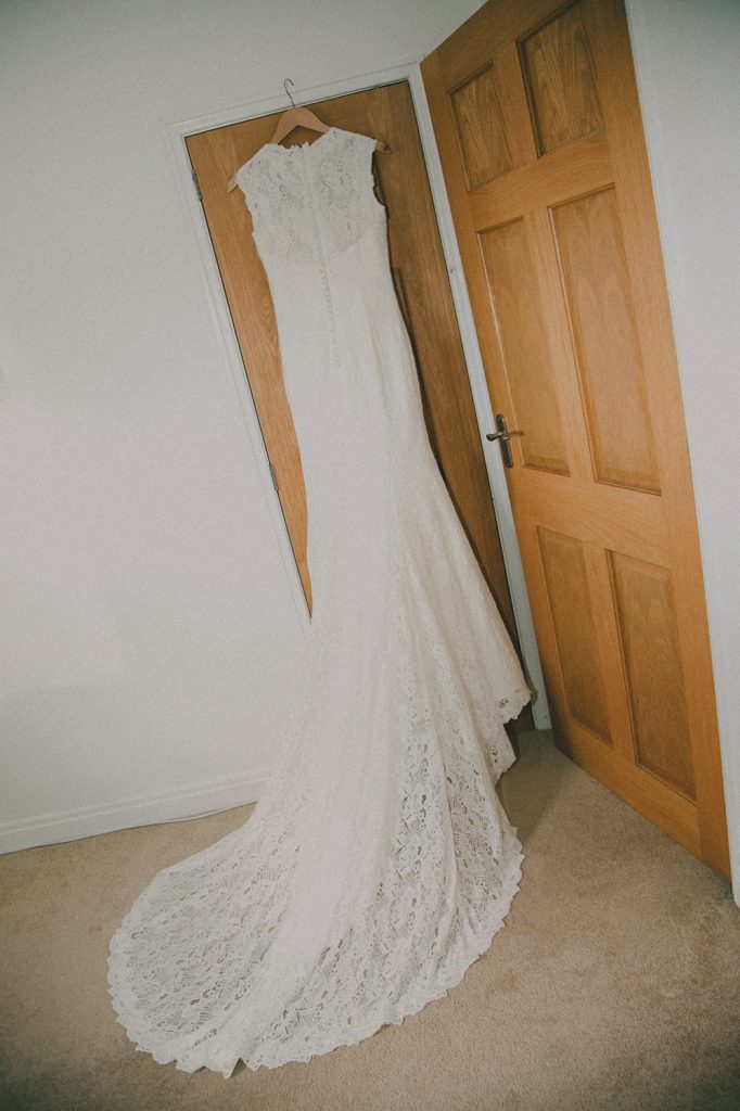 Wedding Dress hanging from bedroom door beforeThe Roker Hotel in Sunderland