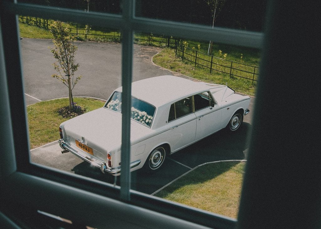 Rolls Royce arriving at the brides home