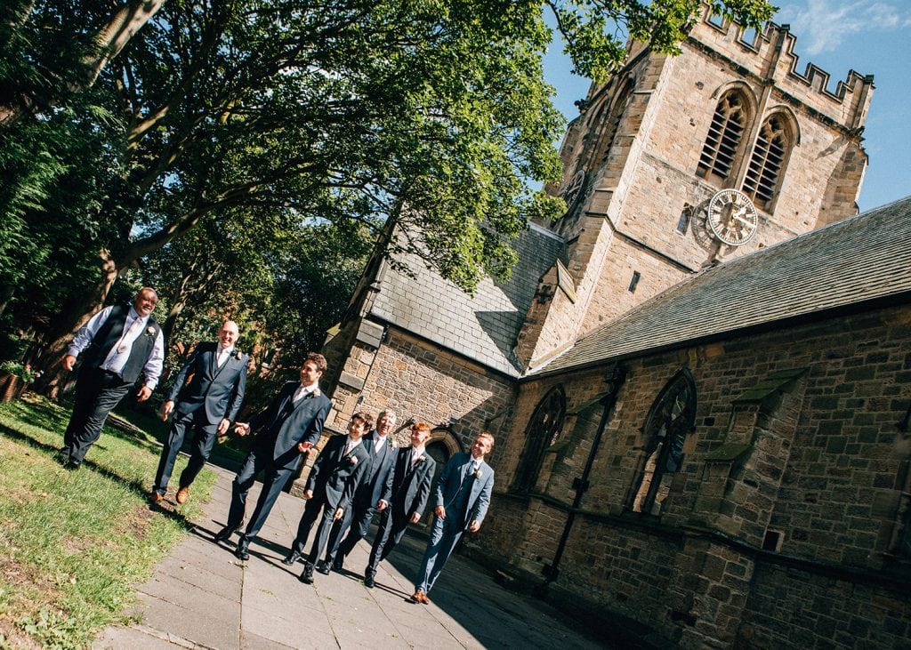 Lads walking through St. Cuthberts Church in Blyth, Northumberland