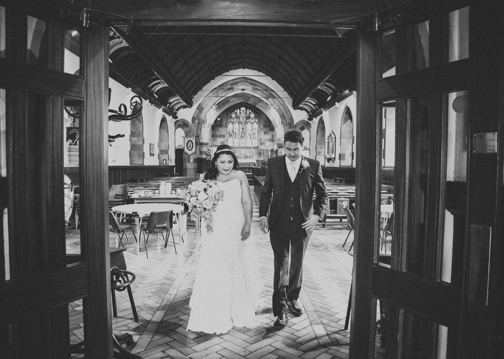 Bride & Groom walking out of St Cuthberts Church in Blyth