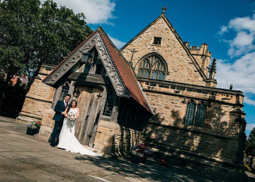 Bride & Groom outside of St Cuthberts Church in Blyth