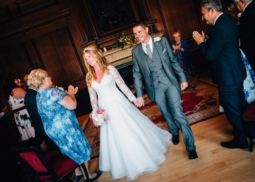 The bride & groom up the aisle of the Ballroom in Morpeth Registry Office. Northumberland