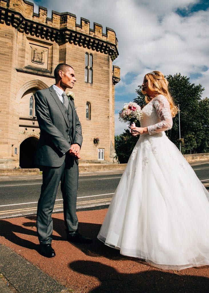 The bride & groom outside Carlisle Park in Morpeth, Northumberland