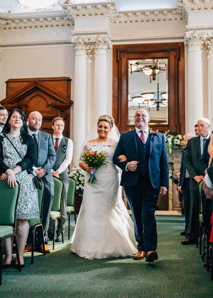Bride walking down the aisle at South Shields Town Hall