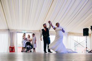 Bride & Groom performing their first dance Guests relaxing in the sun at South Shields Football Club