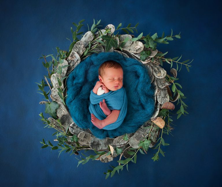 Newborn baby with digital background