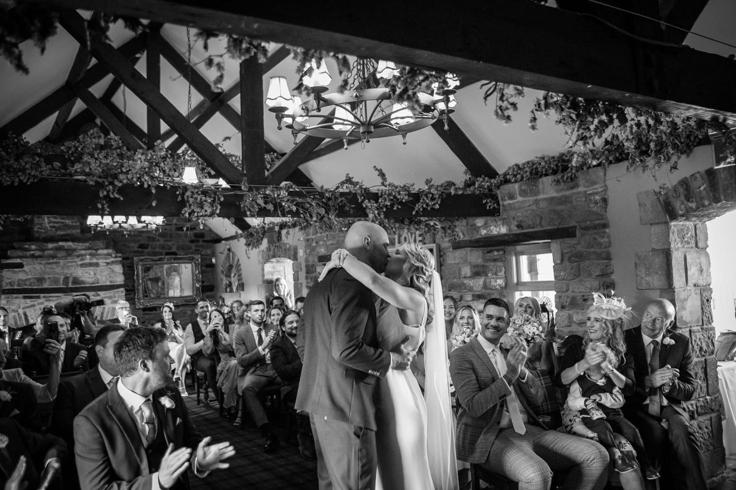 Bride & Groom kissing at Wedding Service at the Black Horse Beamish