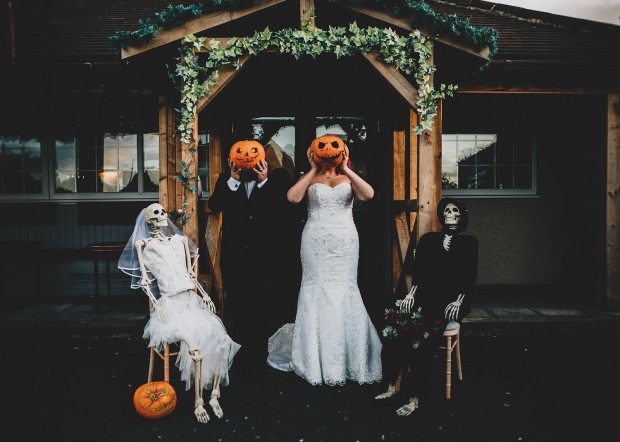 Bride & Groom with Pumpkin Heads outside the Greyhound Inn